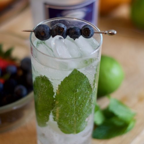 Gin and tonic with mint and blueberries because why the gin not. 